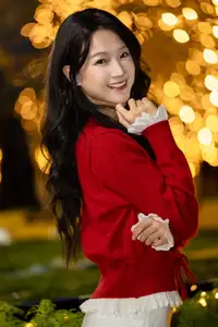Radiant Smile Girl in Red Amidst Twinkling Lights: Warm Beauty for Festive Season - image 14