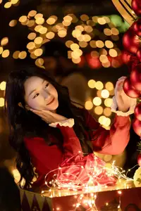 Radiant Smile Girl in Red Amidst Twinkling Lights: Warm Beauty for Festive Season - image 18