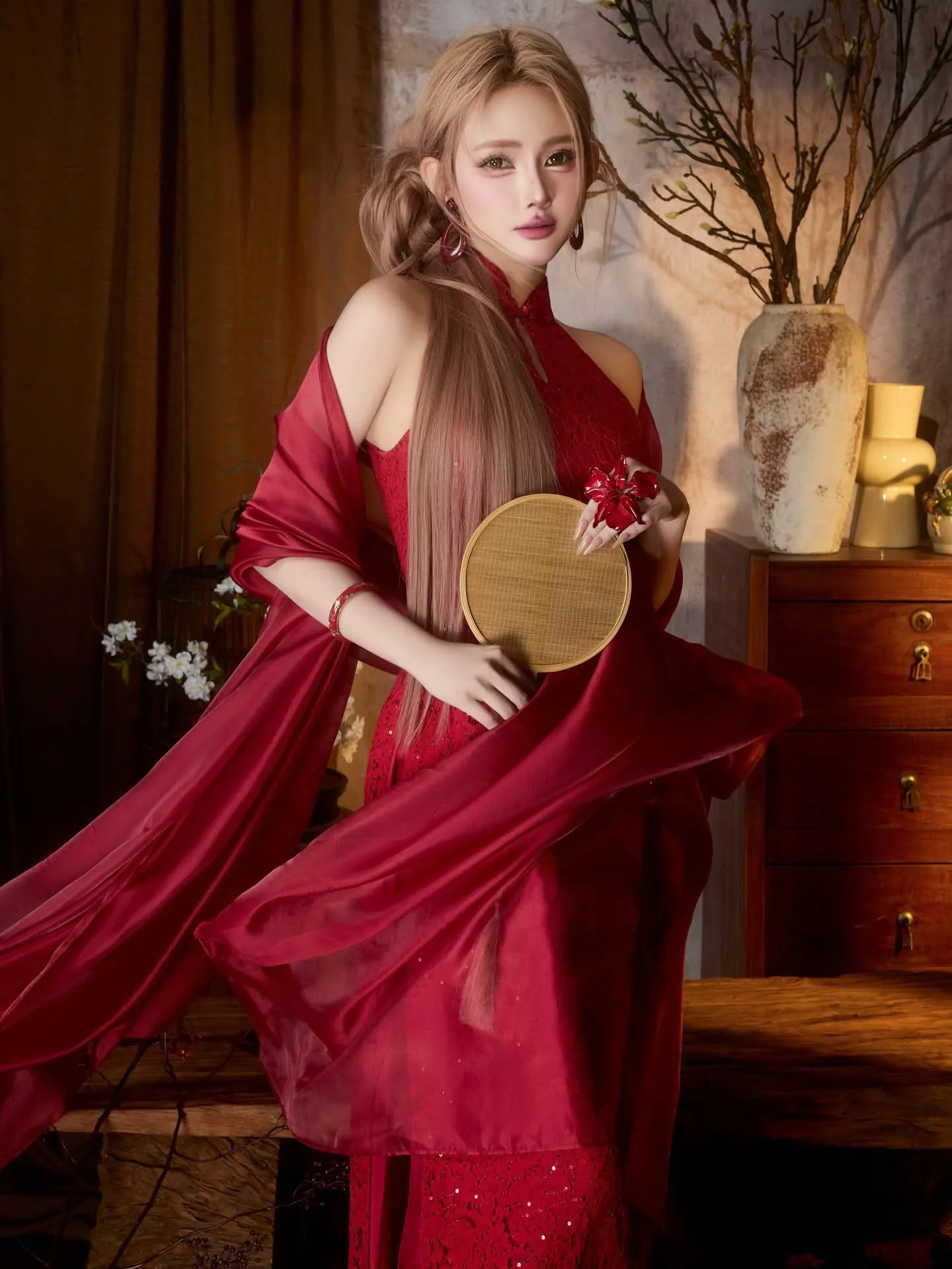 Discover Alluring Traditional Beauty: Girl in a Radiant Red Outfit, Elegant and Mysterious.