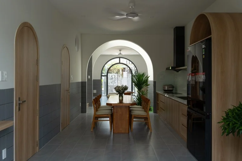 Elegant 2-Story Townhouse Design Featuring Stunning Arched Architectural Accents