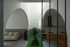 Elegant 2-Story Townhouse Design Featuring Stunning Arched Architectural Accents - image 5