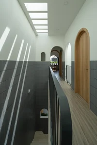 Elegant 2-Story Townhouse Design Featuring Stunning Arched Architectural Accents - image 6