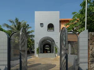 Elegant 2-Story Townhouse Design Featuring Stunning Arched Architectural Accents - image 7