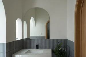 Elegant 2-Story Townhouse Design Featuring Stunning Arched Architectural Accents - image 8