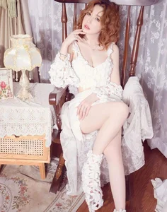 Elly Tran Captivates Fans with Bold and Elegant Fashion Choices in Recent Photoshoot - image 2