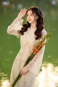 Graceful Ao Dai Vietnamese Beauty Shines Brightly By Serene Lake A Timeless Portrait - image 4