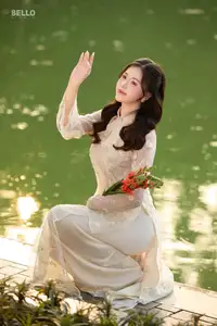Graceful Ao Dai Vietnamese Beauty Shines Brightly By Serene Lake A Timeless Portrait - image 9