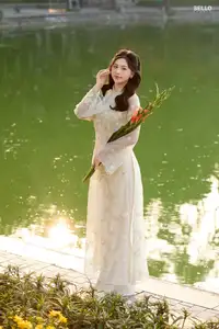 Graceful Ao Dai Vietnamese Beauty Shines Brightly By Serene Lake A Timeless Portrait - image 6