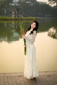 Graceful Ao Dai Vietnamese Beauty Shines Brightly By Serene Lake A Timeless Portrait - image 2