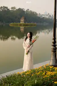 Graceful Ao Dai Vietnamese Beauty Shines Brightly By Serene Lake A Timeless Portrait - image 3
