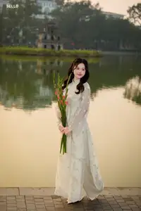 Graceful Ao Dai Vietnamese Beauty Shines Brightly By Serene Lake A Timeless Portrait - image 8