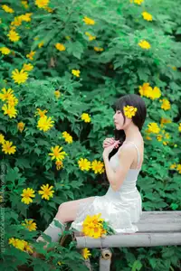Graceful Young Woman in White Dress Amidst Vibrant Yellow Flowers 1000026997 - image 5
