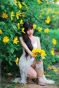 Graceful Young Woman in White Dress Amidst Vibrant Yellow Flowers 1000026997 - image 10