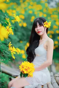 Graceful Young Woman in White Dress Amidst Vibrant Yellow Flowers 1000026997 - image 6