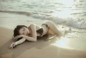 Stunning Thai Influencer with Millions of Fans Showcases Perfect Bikini Body in New Beach Gallery - image 3