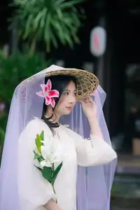 Elegant Vietnamese Beauty with Flowers - image 6