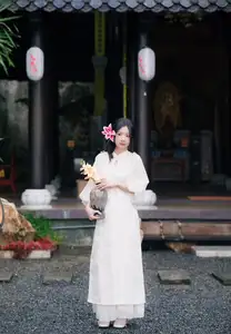 Elegant Vietnamese Beauty with Flowers - image 16