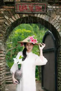 Elegant Vietnamese Beauty with Flowers - image 2