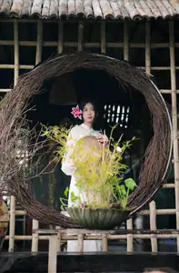 Elegant Vietnamese Beauty with Flowers - image 4