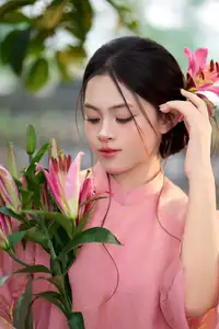 Elegant Pink Ao Dai Amidst Ancient Architecture Capturing Timeless Traditional Beauty - image 6