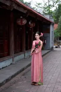 Elegant Pink Ao Dai Amidst Ancient Architecture Capturing Timeless Traditional Beauty - image 8