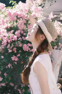 VGU No.174: Youthful Charm of a Girl in a Straw Hat Amidst Blooming Pink Flowers Under Summer Sun - image 1