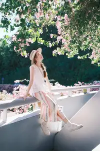 VGU No.174: Youthful Charm of a Girl in a Straw Hat Amidst Blooming Pink Flowers Under Summer Sun - image 2