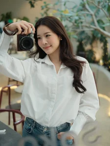 Karen Nguyen radiates effortless elegance in a classic white shirt minimalist look - image 0