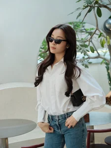 Karen Nguyen radiates effortless elegance in a classic white shirt minimalist look - image 5