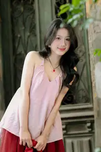 Graceful Vietnamese Beauty: Conical Hat Muse Shines in Ancient Setting - image 17