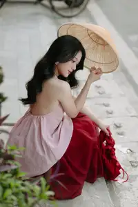 Graceful Vietnamese Beauty: Conical Hat Muse Shines in Ancient Setting - image 10