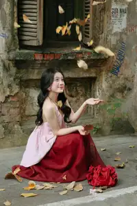 Graceful Vietnamese Beauty: Conical Hat Muse Shines in Ancient Setting - image 8