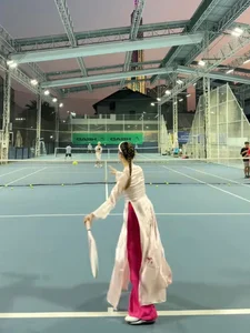 Miss Luong Thuy Linh Stuns in Traditional Ao Dai on the Tennis Court - image 7