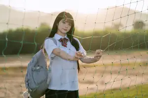 Youthful Schoolgirl in Uniform: Serene Golden Hour Beauty, a Glimpse into Nostalgic Student Life. - image 8