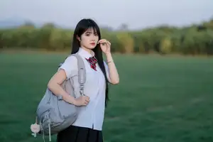 Youthful Schoolgirl in Uniform: Serene Golden Hour Beauty, a Glimpse into Nostalgic Student Life. - image 3