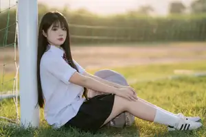 Youthful Schoolgirl in Uniform: Serene Golden Hour Beauty, a Glimpse into Nostalgic Student Life. - image 14
