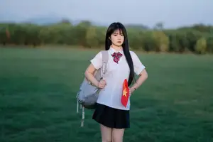 Youthful Schoolgirl in Uniform: Serene Golden Hour Beauty, a Glimpse into Nostalgic Student Life. - image 4