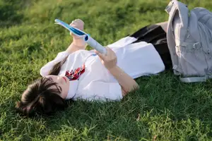 Youthful Schoolgirl in Uniform: Serene Golden Hour Beauty, a Glimpse into Nostalgic Student Life. - image 2