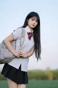 Youthful Schoolgirl in Uniform: Serene Golden Hour Beauty, a Glimpse into Nostalgic Student Life. - image 1
