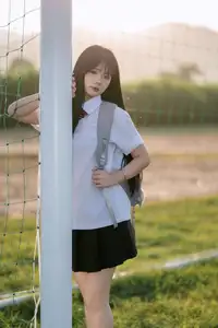 Youthful Schoolgirl in Uniform: Serene Golden Hour Beauty, a Glimpse into Nostalgic Student Life. - image 10