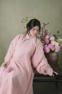 Muse in Pastel Pink A Timeless Portrait of Nostalgia - image 5