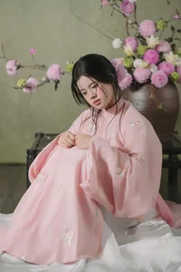 Muse in Pastel Pink A Timeless Portrait of Nostalgia - image 4