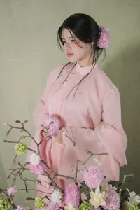 Muse in Pastel Pink A Timeless Portrait of Nostalgia - image 1