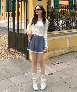 Saigon Street Style: Local Beauty Turns Heads with Chic Summer Outfit and Impressive Long Legs - image 1