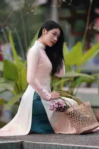 Captivating Grace: Vietnamese Girl in Traditional Ao Dai Beauty 1000025136 - image 2