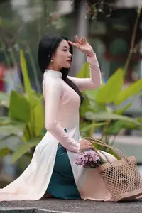 Captivating Grace: Vietnamese Girl in Traditional Ao Dai Beauty 1000025136 - image 12