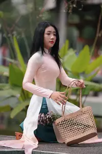 Captivating Grace: Vietnamese Girl in Traditional Ao Dai Beauty 1000025136 - image 18