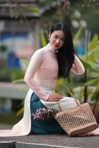 Captivating Grace: Vietnamese Girl in Traditional Ao Dai Beauty 1000025136 - image 16