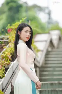 Captivating Grace: Vietnamese Girl in Traditional Ao Dai Beauty 1000025136 - image 13