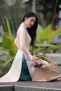 Captivating Grace: Vietnamese Girl in Traditional Ao Dai Beauty 1000025136 - image 17